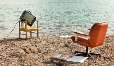 vintage decor on the lake shore, armchair and television